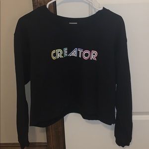 black “creator” cropped long sleeve
